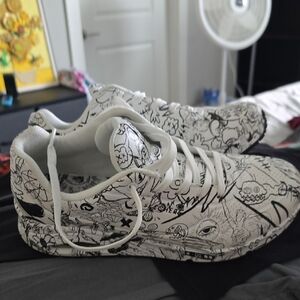 White Sneakers with Black Graphic Design